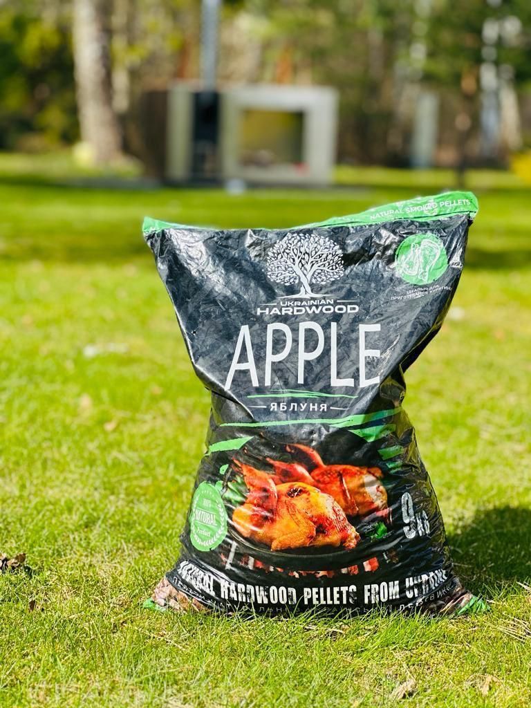 9 kg bag of apple smoking pellets on a lawn