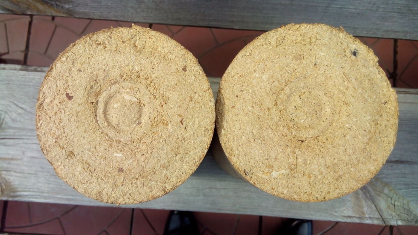 Ends of two round Nestro briquettes